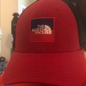 The North Face cap, nice red and blue, let’s roll!